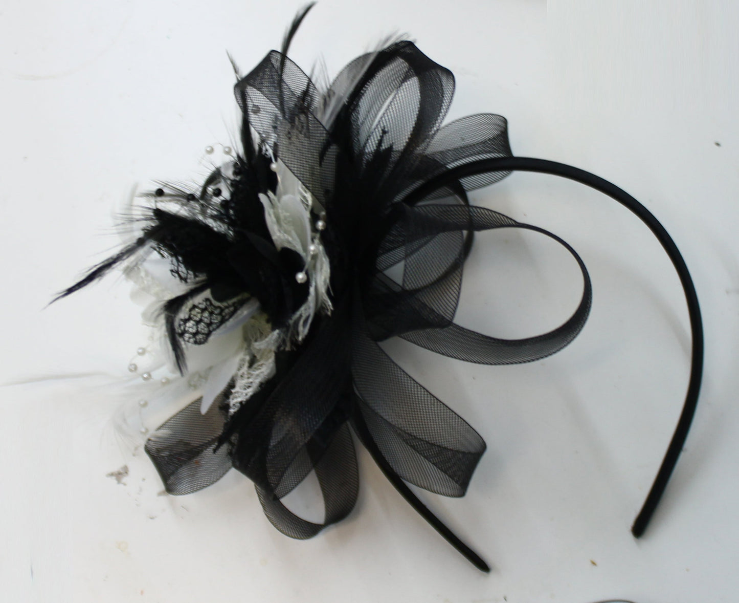 Black and Cream flower fascinator on Headband