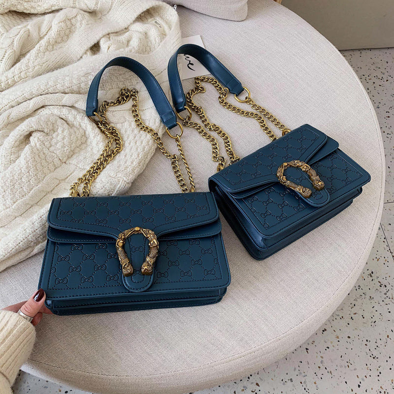 Inclined shoulder bag