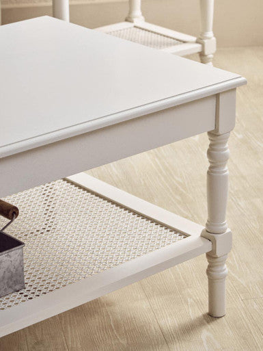 White Wooden Coffee Table with Cane Webbed Lower Shelf and Carved Spindle Legs, Heritage