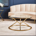 Allure Champagne Stainless Steel Round Coffee Table with Hourglass Base