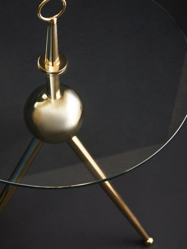 Clear Glass Top Side Table with Gold Tripod Metal Frame and Globe Detail, Oria