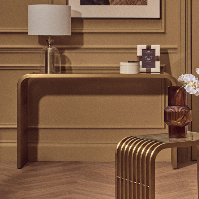 Matte Gold Slatted Console Table with Clear Glass Top, Vogue