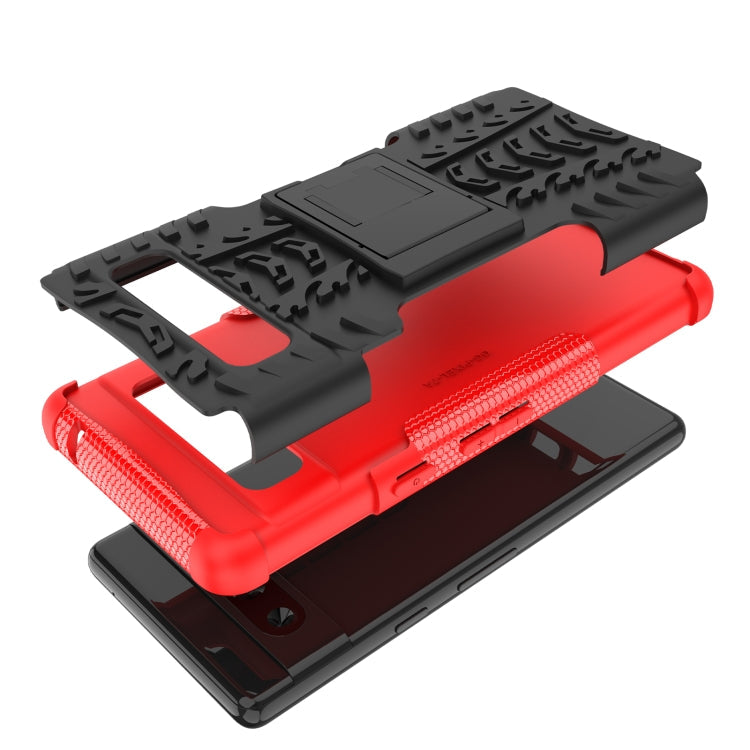 For Google Pixel 7a Tire Texture TPU + PC Phone Case with Holder(Red)