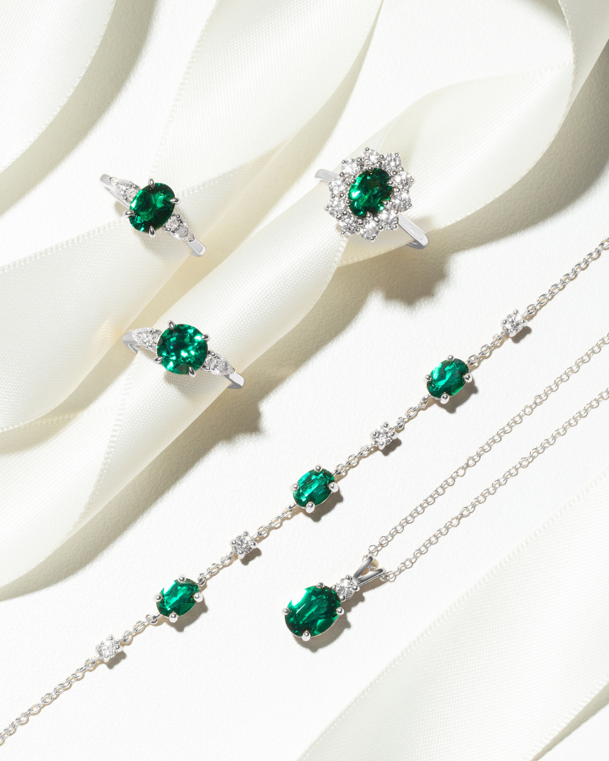Emerald Halo Engagement Ring in Sterling Silver