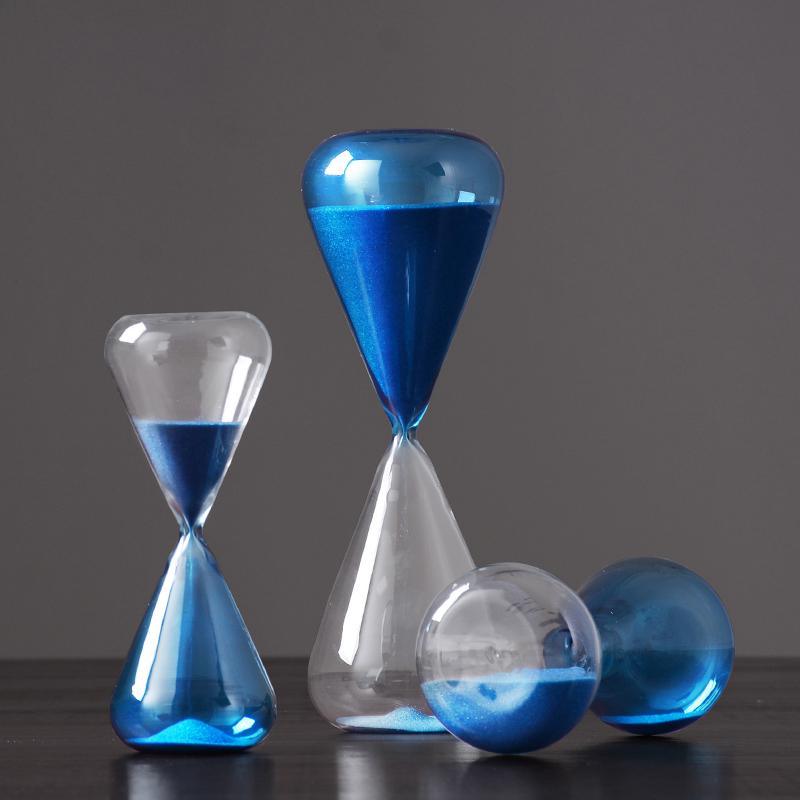 Decoration: A Set Of Three Hourglasses