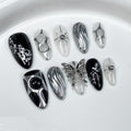 GLORS Gothic Long Almond Press-On Nails – Black & Silver with Butterfly Accent (10 Pieces)