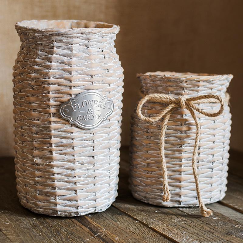 MI37 A Set Of Two Rattan Outdoor Plant Stands