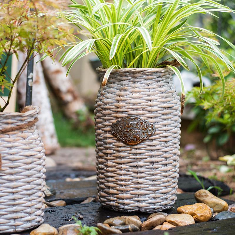 MI37 A Set Of Two Rattan Outdoor Plant Stands