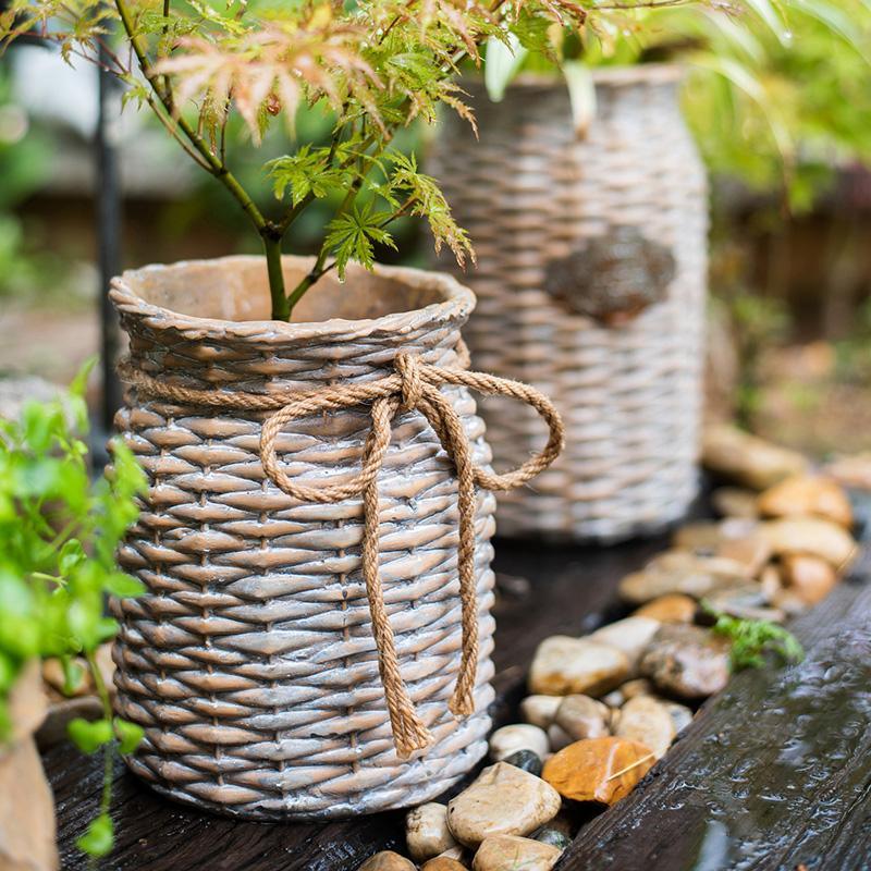 MI37 A Set Of Two Rattan Outdoor Plant Stands